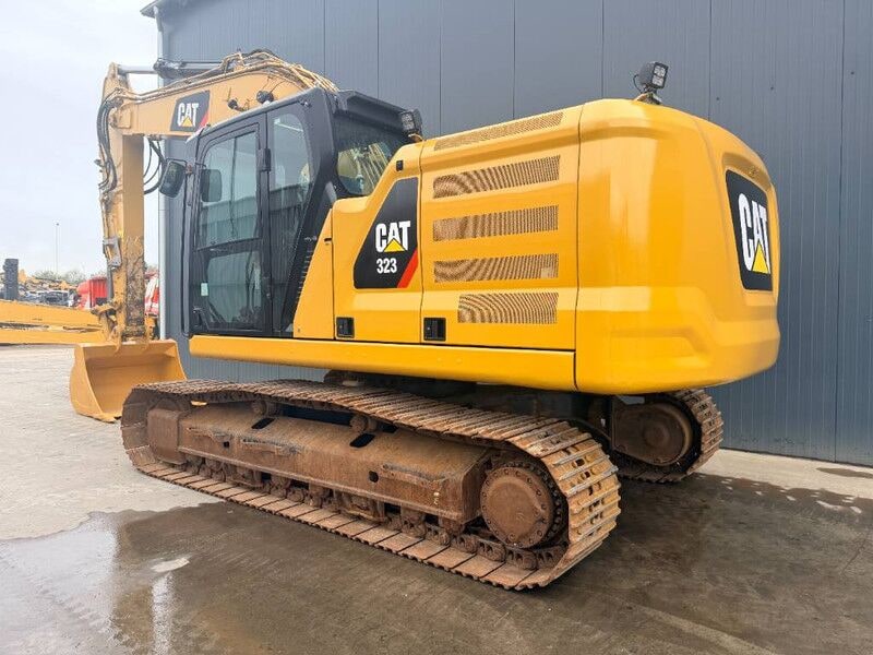 2018 Caterpillar 323 crawler excavator, rear three-quarter view 2018 Caterpillar 323 crawler excavator, rear three-quarter view