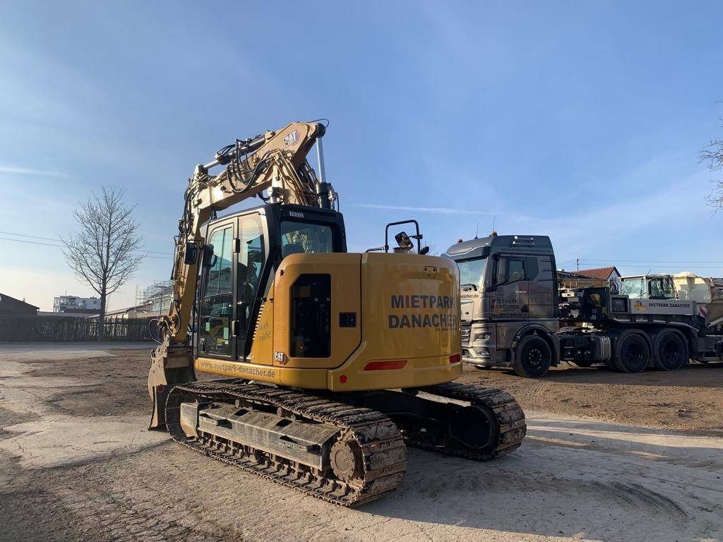 2022 Caterpillar 315-07B crawler excavator, rear three-quarter view