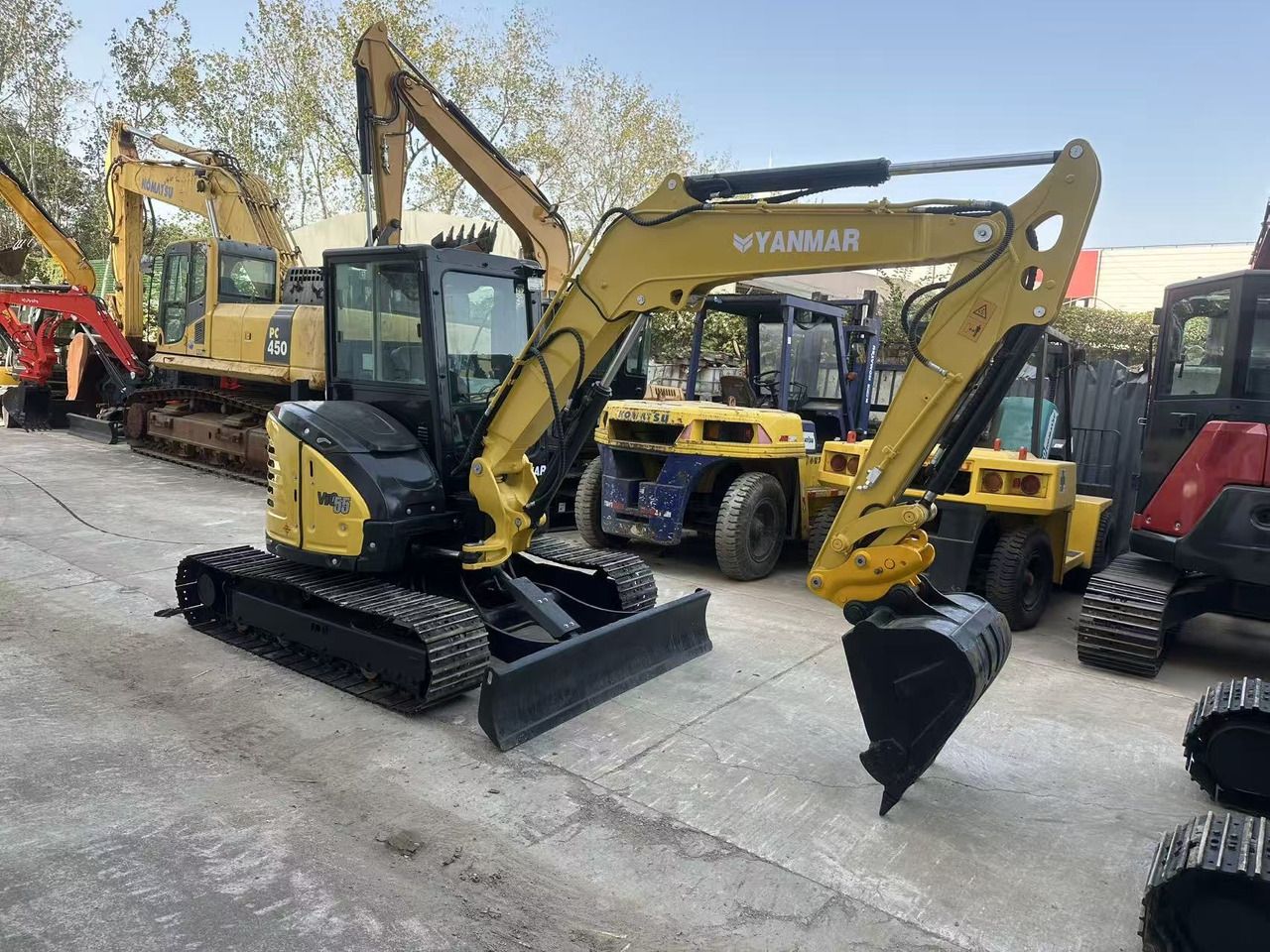 2024 Yanmar VIO55-6 mini excavator, front three-quarter view 2024 Yanmar VIO55-6 mini excavator, front three-quarter view