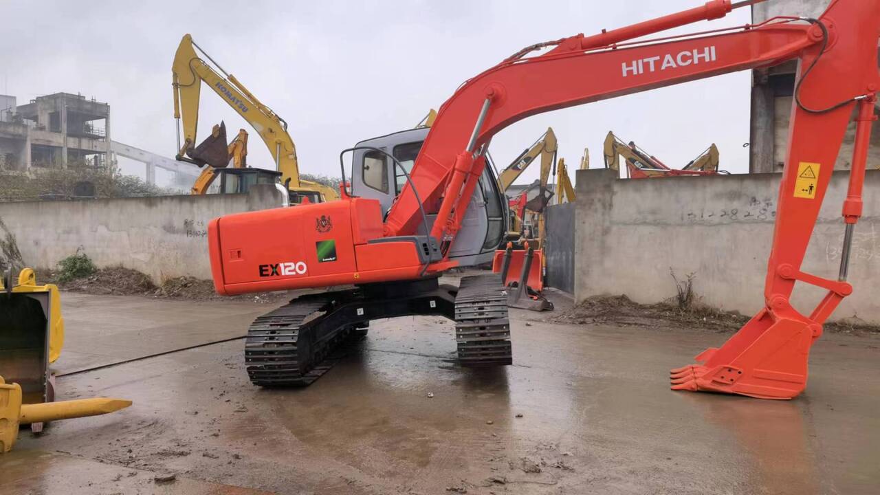2015 Hitachi EX120-5 crawler excavator, rear three-quarter view 2015 Hitachi EX120-5 crawler excavator, rear three-quarter view