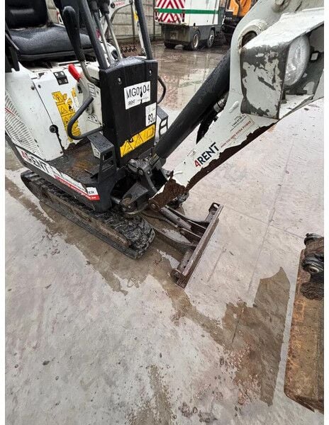 Bobcat E10Z mini excavator, high-angle view of the operator station and boom