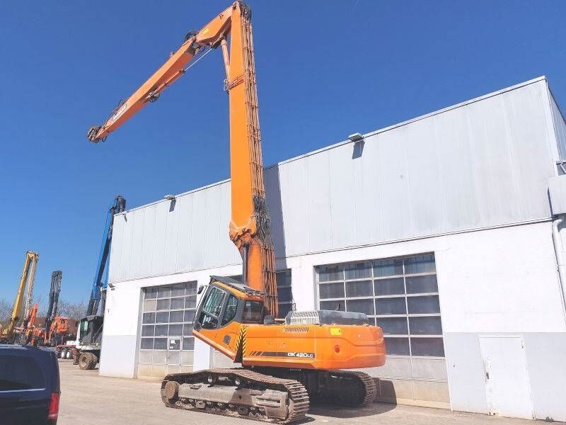 2012 Doosan DX420LC demolition excavator, rear three-quarter view 2012 Doosan DX420LC demolition excavator, rear three-quarter view