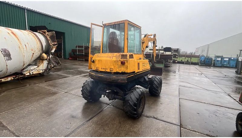 1990 Komatsu PW30-1 wheel excavator rear view 1990 Komatsu PW30-1 wheel excavator rear view