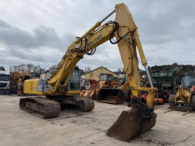 2011 New Holland E215B crawler excavator, side view 2011 New Holland E215B crawler excavator, side view