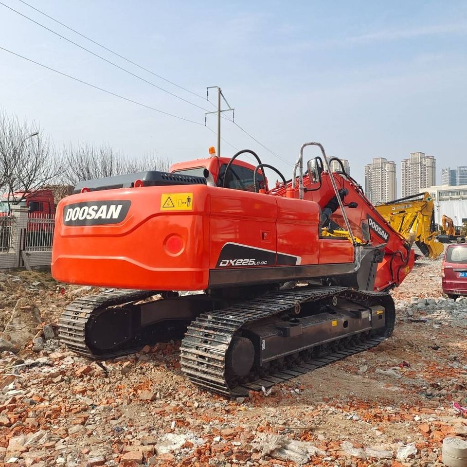 2023 Doosan DX225LC-9C crawler excavator, rear three-quarter view 2023 Doosan DX225LC-9C crawler excavator, rear three-quarter view