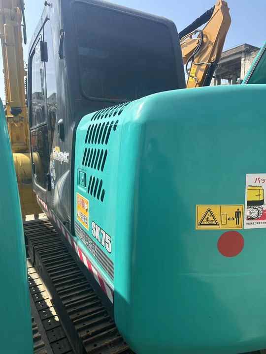 2023 Kobelco SK75-8 mini excavator, rear three-quarter view 2023 Kobelco SK75-8 mini excavator, rear three-quarter view