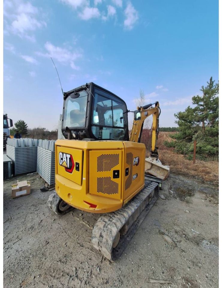 2022 Caterpillar 304 crawler excavator rear three-quarter view 2022 Caterpillar 304 crawler excavator rear three-quarter view