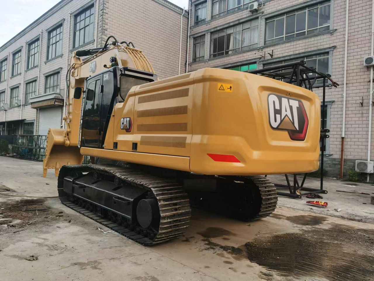 2022 Caterpillar 336GC crawler excavator, rear three-quarter view 2022 Caterpillar 336GC crawler excavator, rear three-quarter view