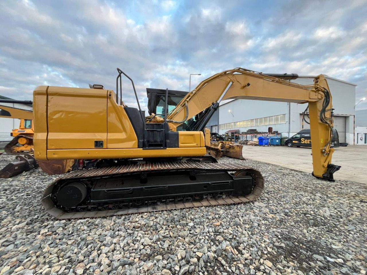 2020 Caterpillar 323-07 crawler excavator, side profile view 2020 Caterpillar 323-07 crawler excavator, side profile view