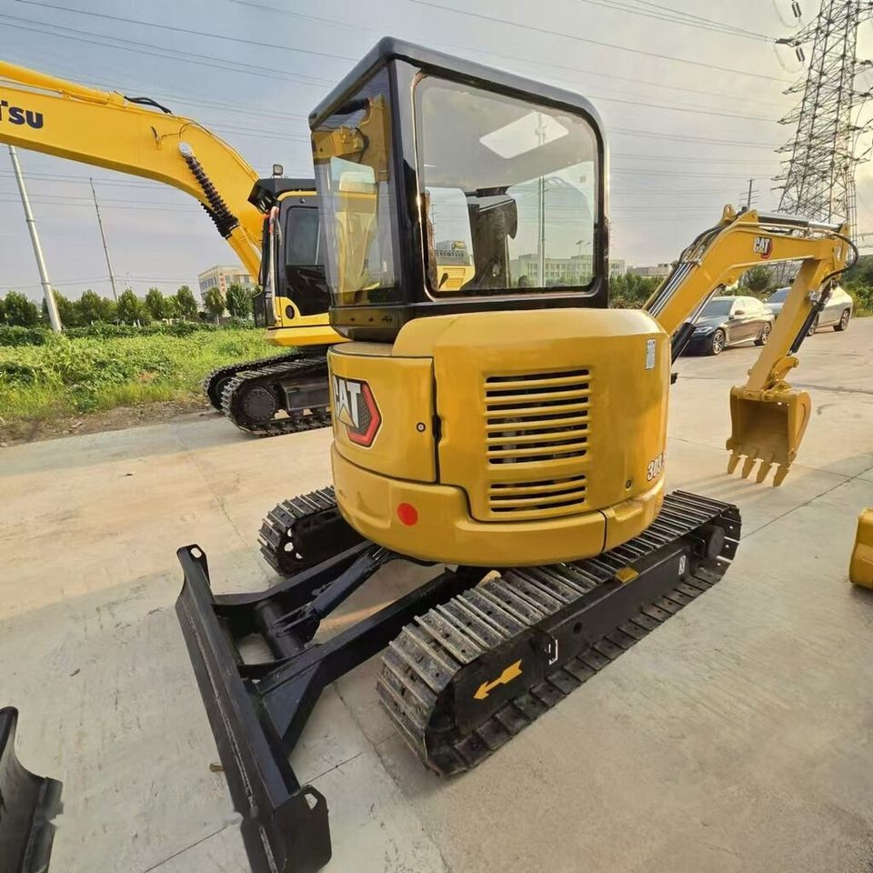 2024 Caterpillar 303.5E mini excavator rear three-quarter view 2024 Caterpillar 303.5E mini excavator rear three-quarter view
