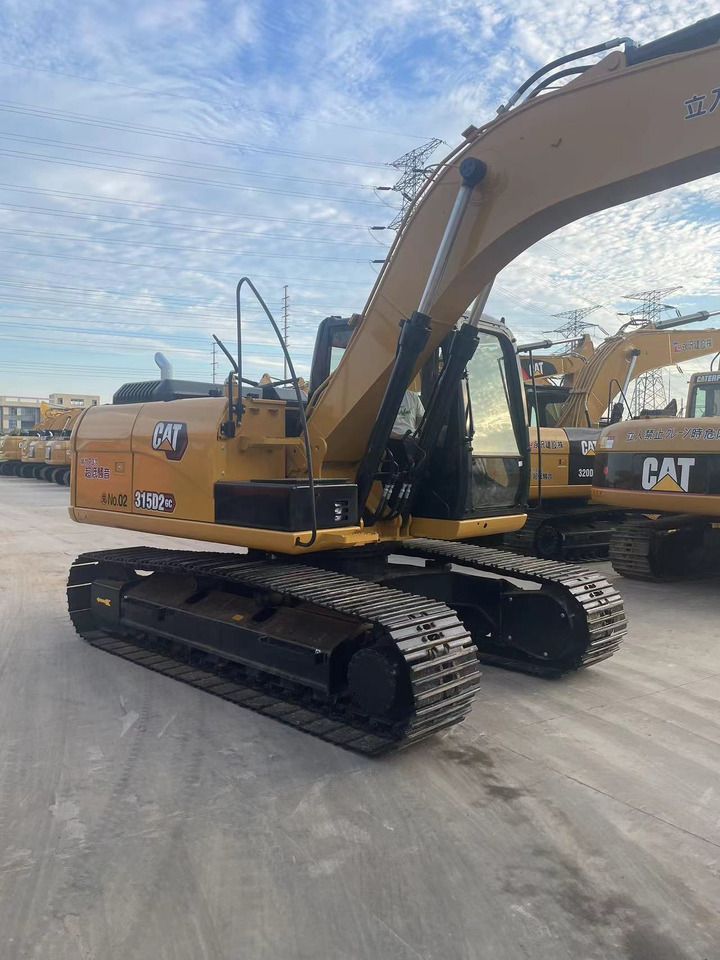 2024 Caterpillar 315D2 GC crawler excavator, rear three-quarter view