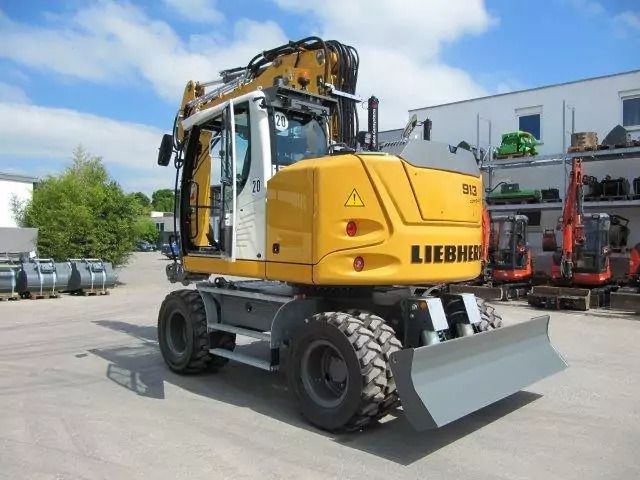 2022 Liebherr A 913 Compact wheel excavator rear three-quarter view 2022 Liebherr A 913 Compact wheel excavator rear three-quarter view