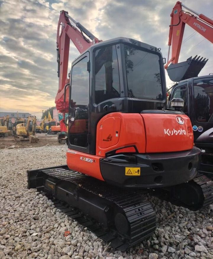 Kubota KX165 mini excavator, rear three-quarter view Kubota KX165 mini excavator, rear three-quarter view