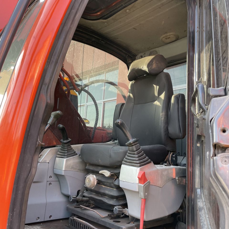Doosan DX140LC-9C Crawler Excavator cab interior view Doosan DX140LC-9C Crawler Excavator cab interior view