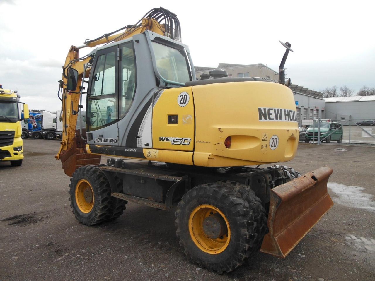 2011 New Holland WE150 wheel excavator, rear three-quarter view 2011 New Holland WE150 wheel excavator, rear three-quarter view