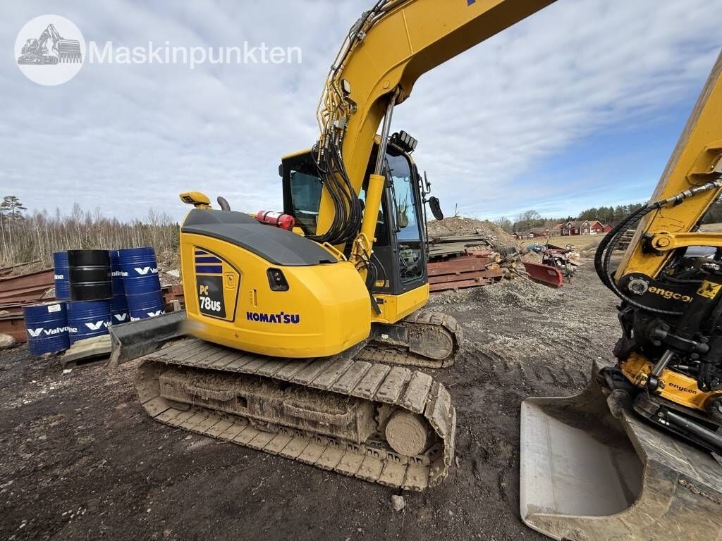 2022 Komatsu PC78US-11E0 crawler excavator, rear three-quarter view 2022 Komatsu PC78US-11E0 crawler excavator, rear three-quarter view