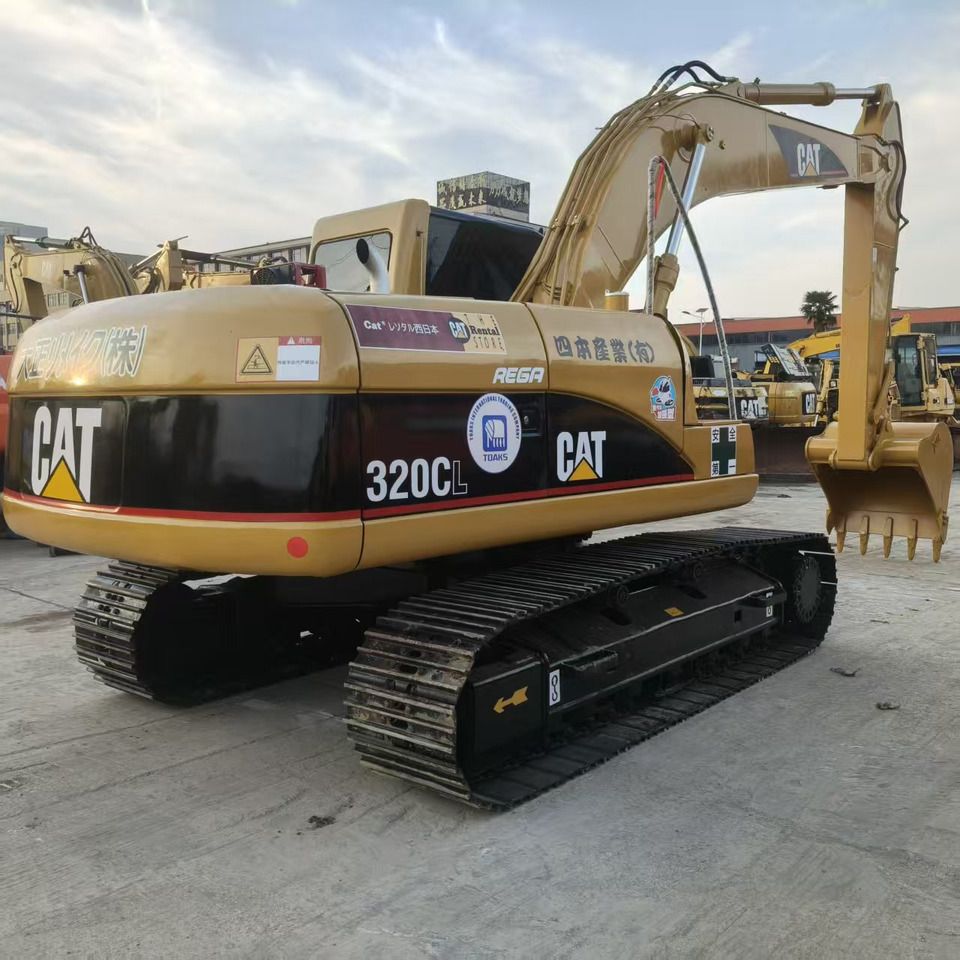 2019 Caterpillar 320CL excavator, rear three-quarter view 2019 Caterpillar 320CL excavator, rear three-quarter view