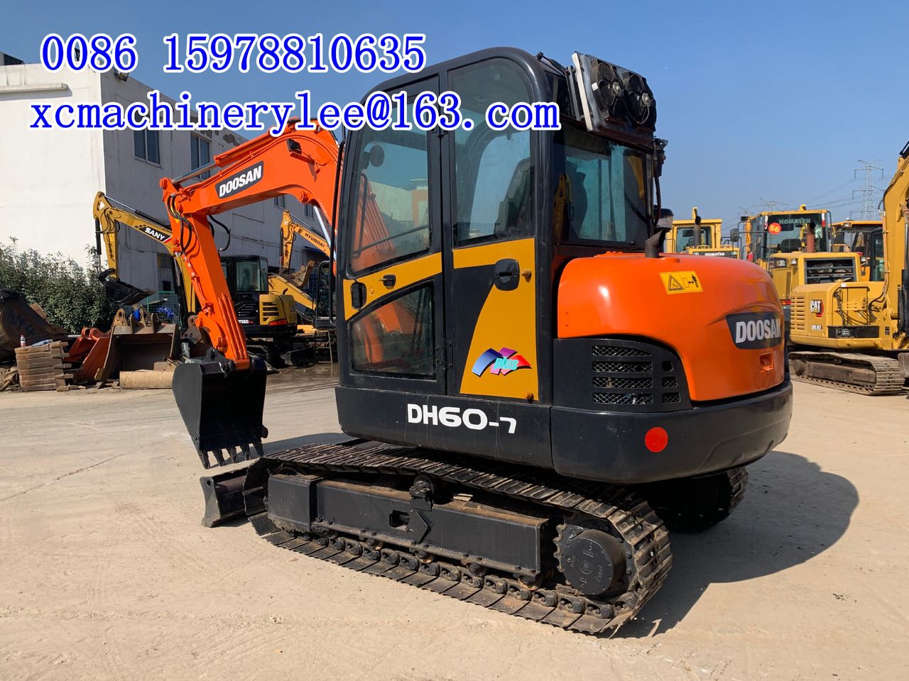 2023 Doosan DH60-7 mini excavator, rear three-quarter view 2023 Doosan DH60-7 mini excavator, rear three-quarter view