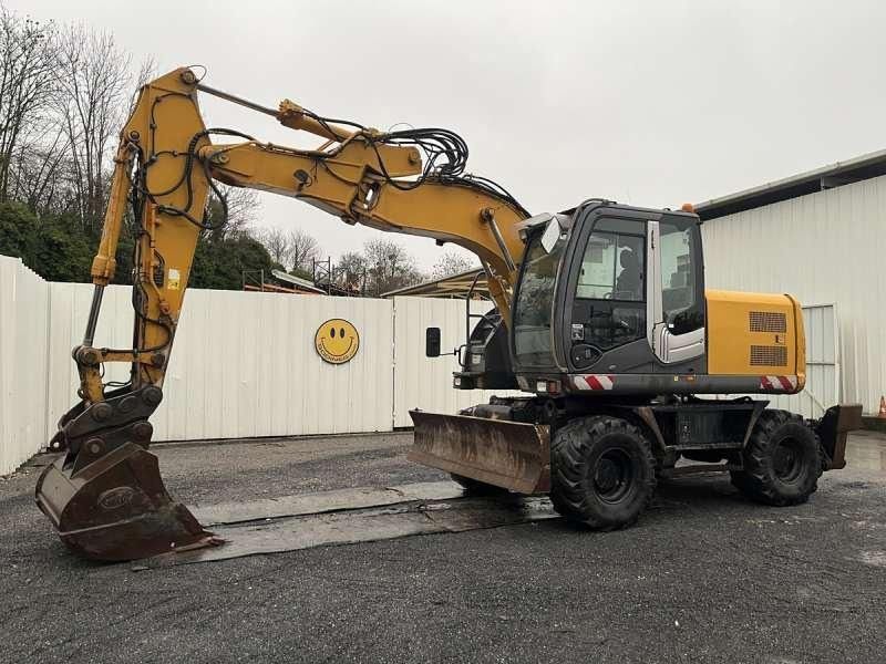 2010 Hitachi ZX140W-3 wheel excavator, side profile view 2010 Hitachi ZX140W-3 wheel excavator, side profile view