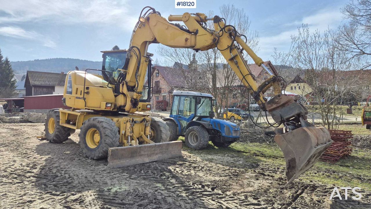 2013 Komatsu PW118 MR-8 wheel excavator, side profile view 2013 Komatsu PW118 MR-8 wheel excavator, side profile view