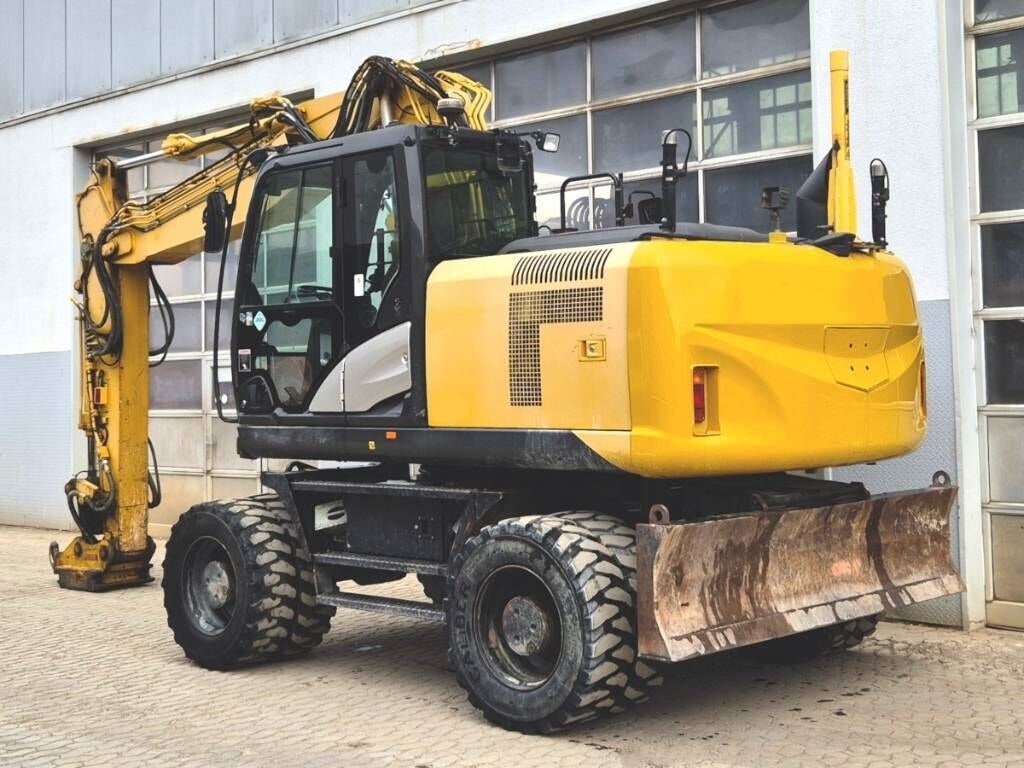 2016 Hitachi ZX170W-5 wheel excavator, rear three-quarter view 2016 Hitachi ZX170W-5 wheel excavator, rear three-quarter view