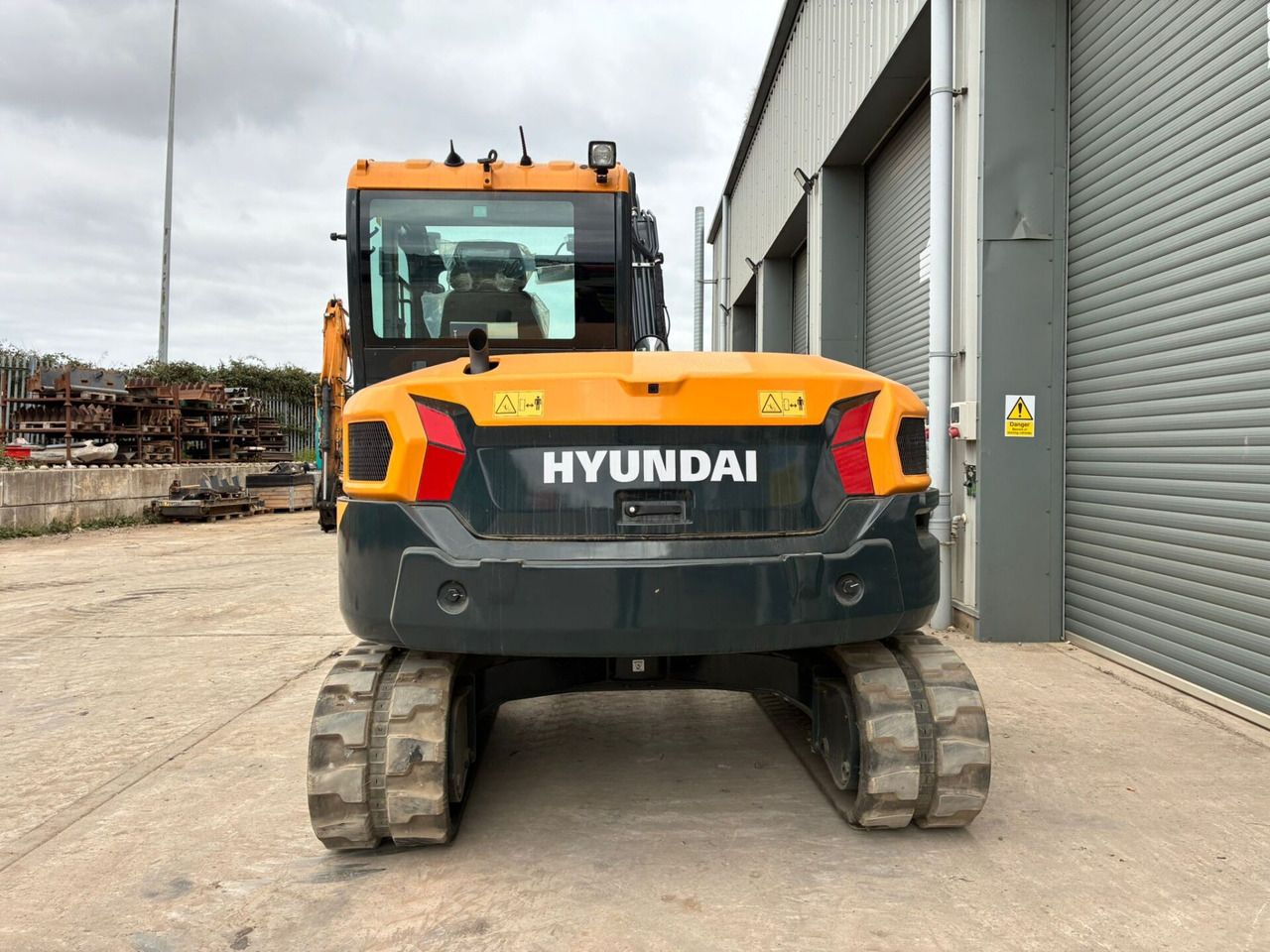 2023 Hyundai HX85A mini excavator, rear view 2023 Hyundai HX85A mini excavator, rear view