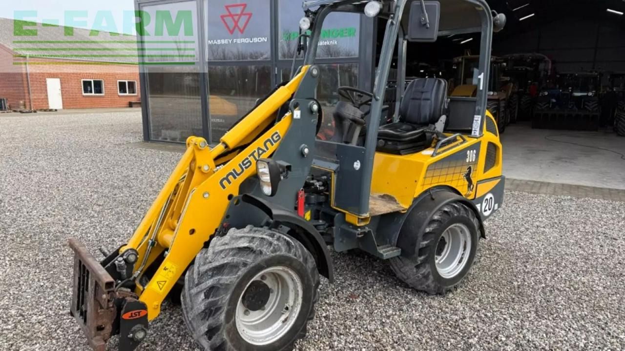 2014 Mustang AL 306 mini excavator, front three-quarter view 2014 Mustang AL 306 mini excavator, front three-quarter view