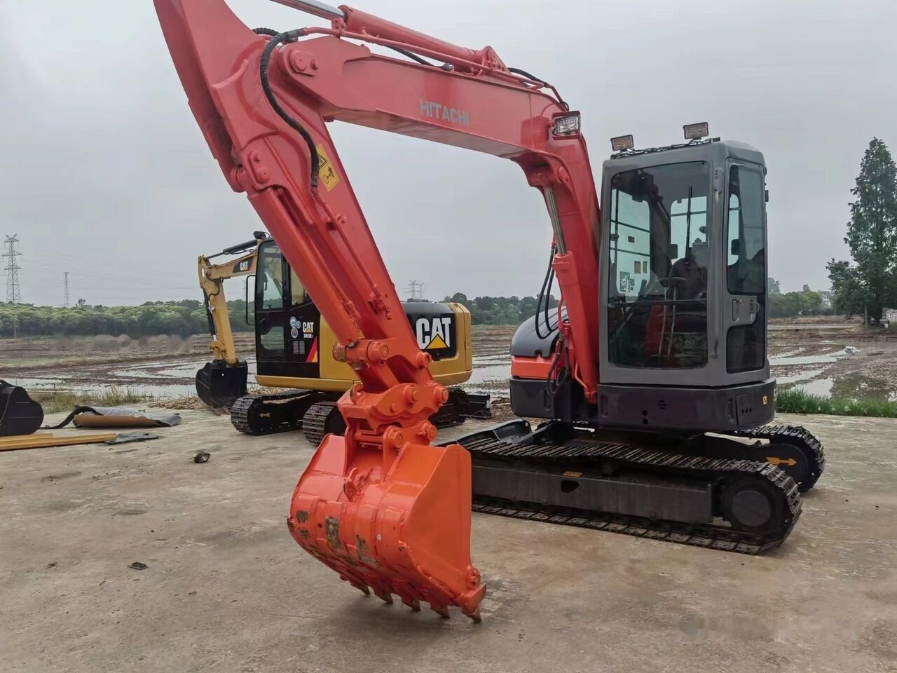 Hitachi ZX55 mini excavator, front three-quarter view Hitachi ZX55 mini excavator, front three-quarter view