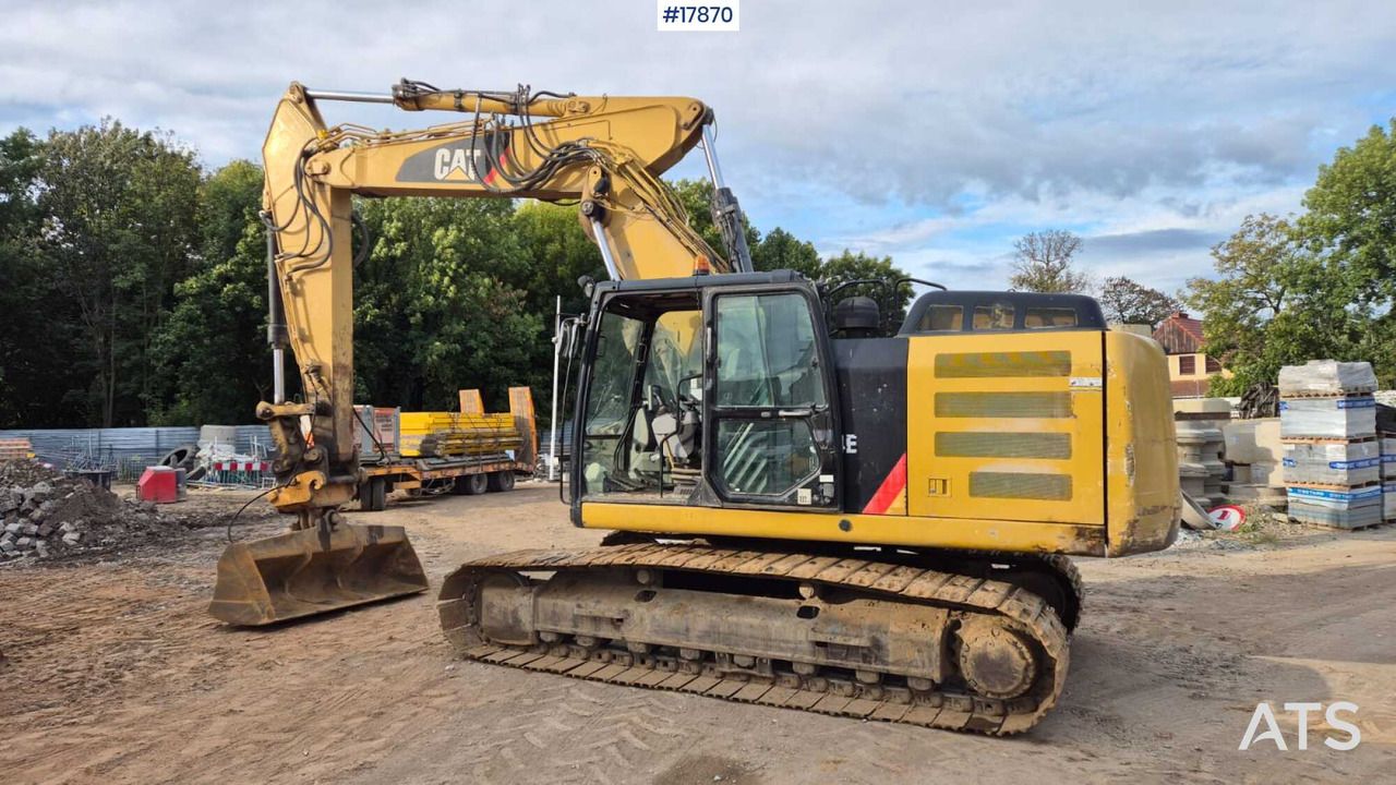 2012 Caterpillar 324E crawler excavator, side view 2012 Caterpillar 324E crawler excavator, side view