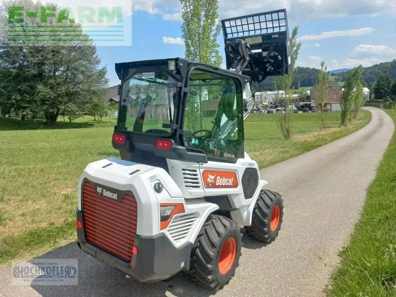 2022 Bobcat L28E mini excavator, rear three-quarter view 2022 Bobcat L28E mini excavator, rear three-quarter view