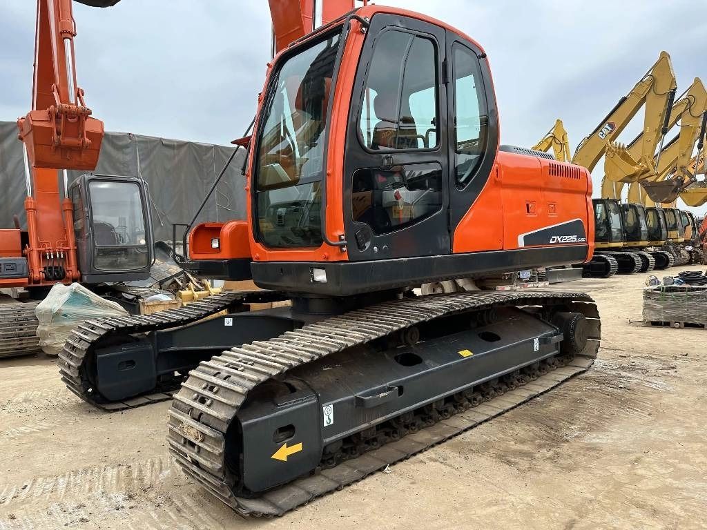 2023 Doosan DX225LC-9C crawler excavator, front three-quarter view
