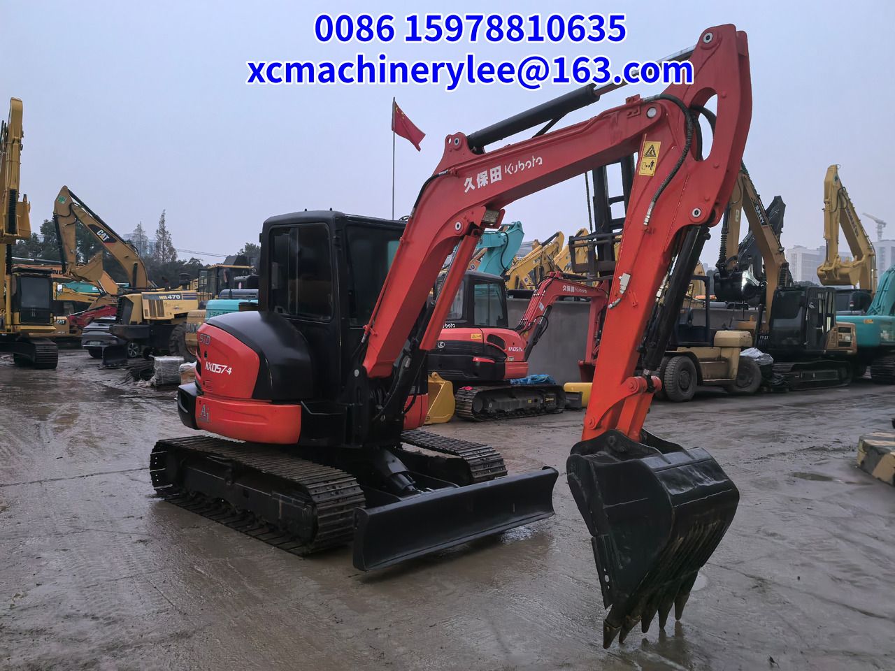 2024 Kubota KX057-4 mini excavator, side view
