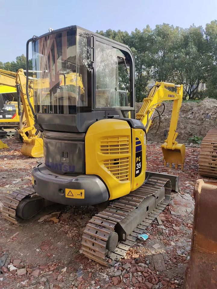 2018 Komatsu PC35 mini excavator, rear three-quarter view 2018 Komatsu PC35 mini excavator, rear three-quarter view
