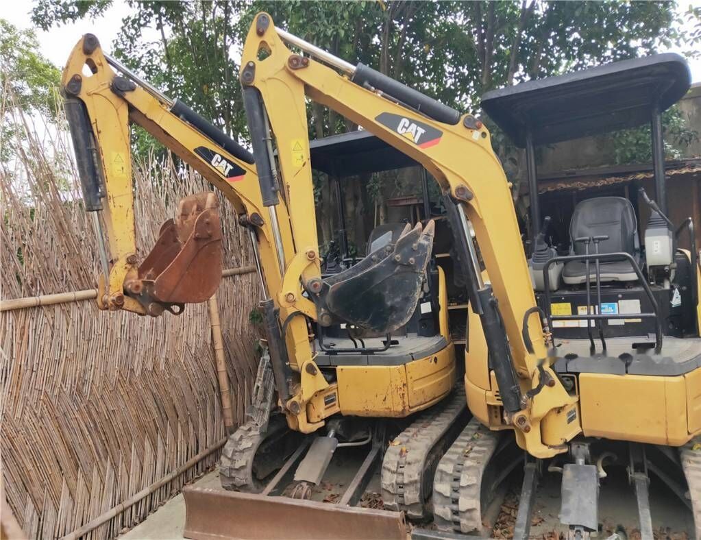 2018 Caterpillar 302C mini excavator, front three-quarter view