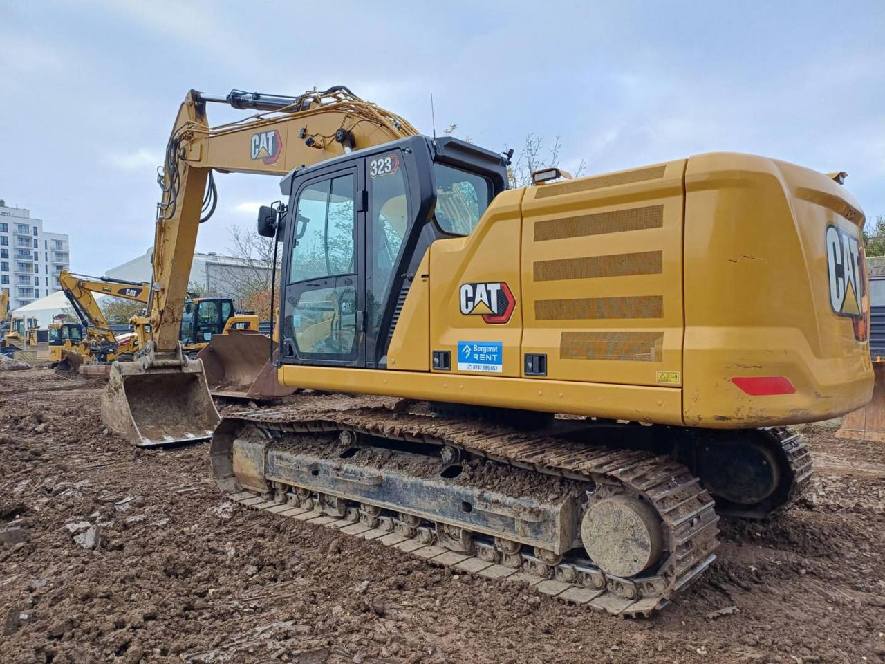 2024 Caterpillar 323-07 crawler excavator, rear three-quarter view 2024 Caterpillar 323-07 crawler excavator, rear three-quarter view