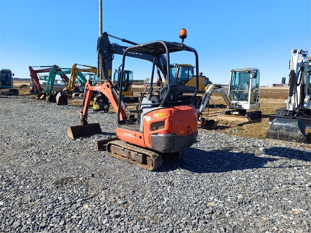 2013 Kubota KX015-4 mini excavator, rear three-quarter view 2013 Kubota KX015-4 mini excavator, rear three-quarter view