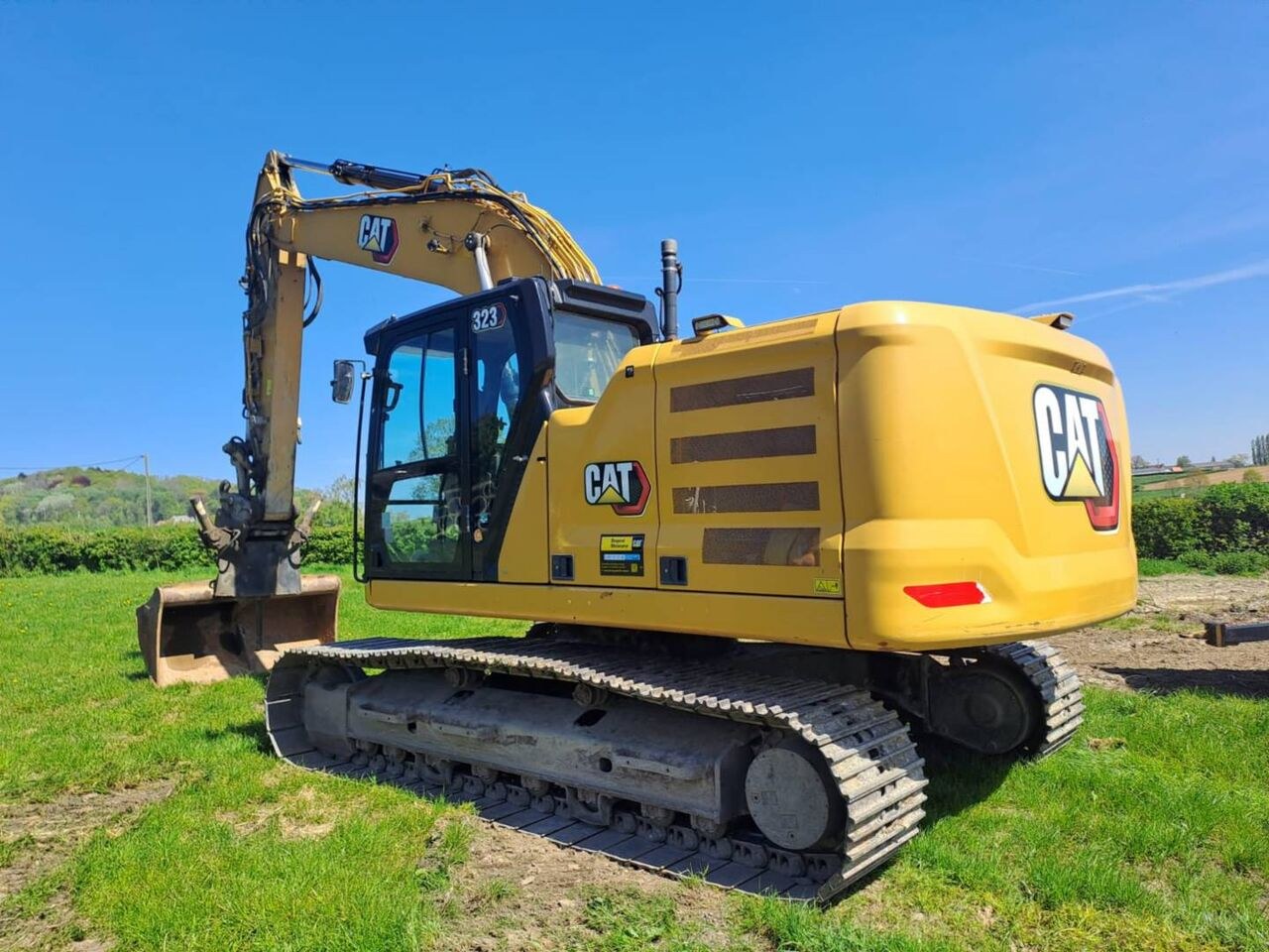 2021 Caterpillar 323-07 crawler excavator, rear three-quarter view 2021 Caterpillar 323-07 crawler excavator, rear three-quarter view