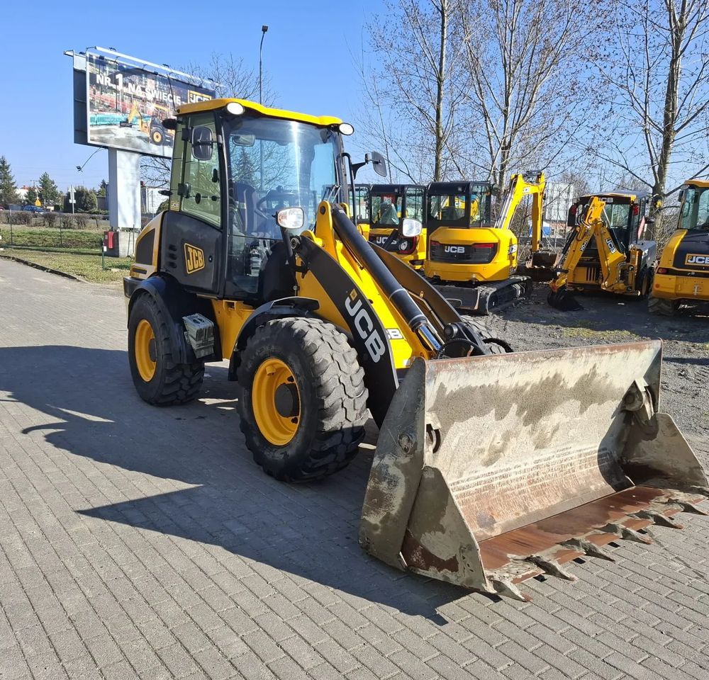 2019 JCB 409 wheel loader, front three-quarter view 2019 JCB 409 wheel loader, front three-quarter view