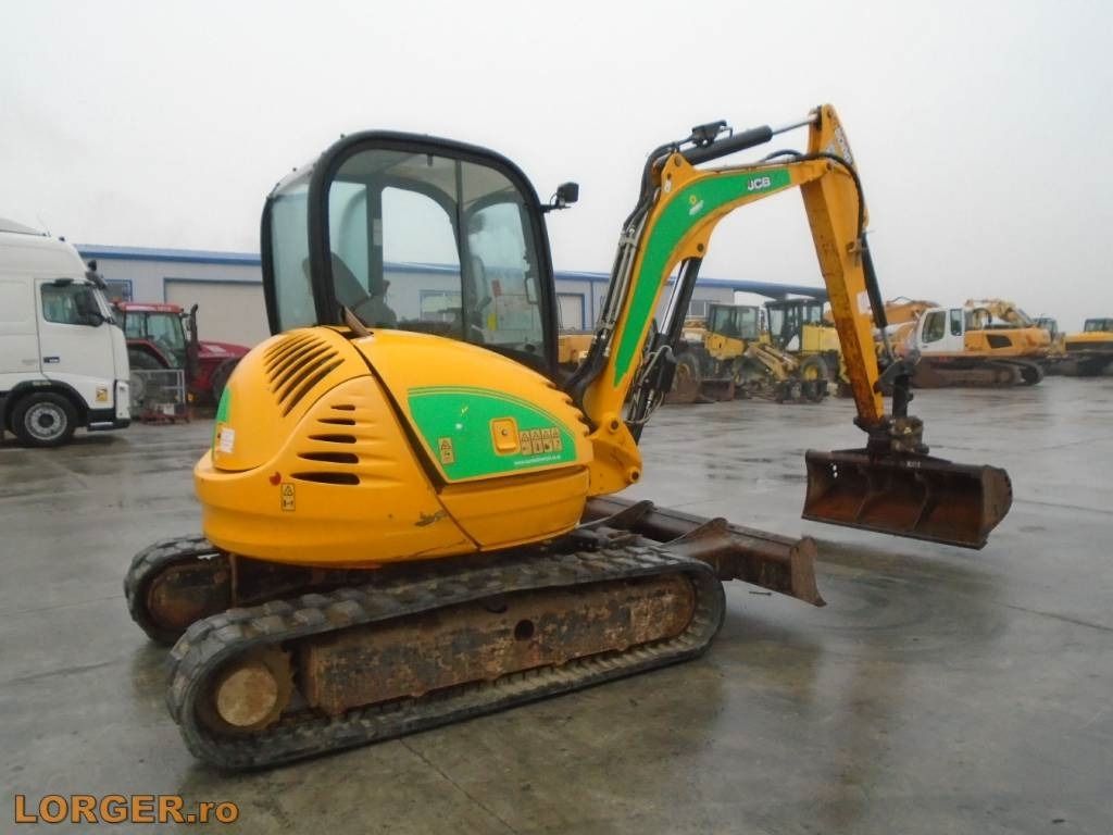 2015 JCB 8055 RTS mini excavator, rear three-quarter view 2015 JCB 8055 RTS mini excavator, rear three-quarter view