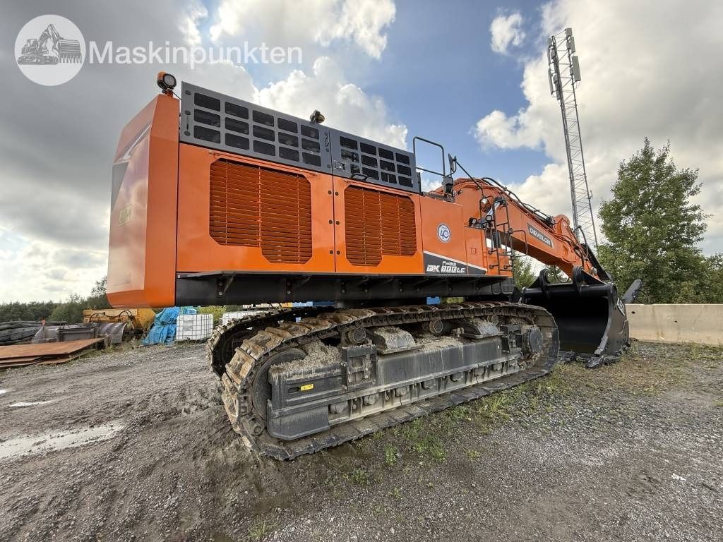 2025 Develon DX800LC crawler excavator, rear three-quarter view