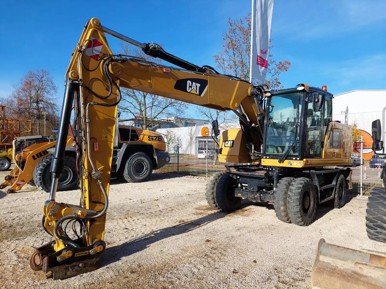 2017 Caterpillar M318F wheel excavator, front three-quarter view 2017 Caterpillar M318F wheel excavator, front three-quarter view