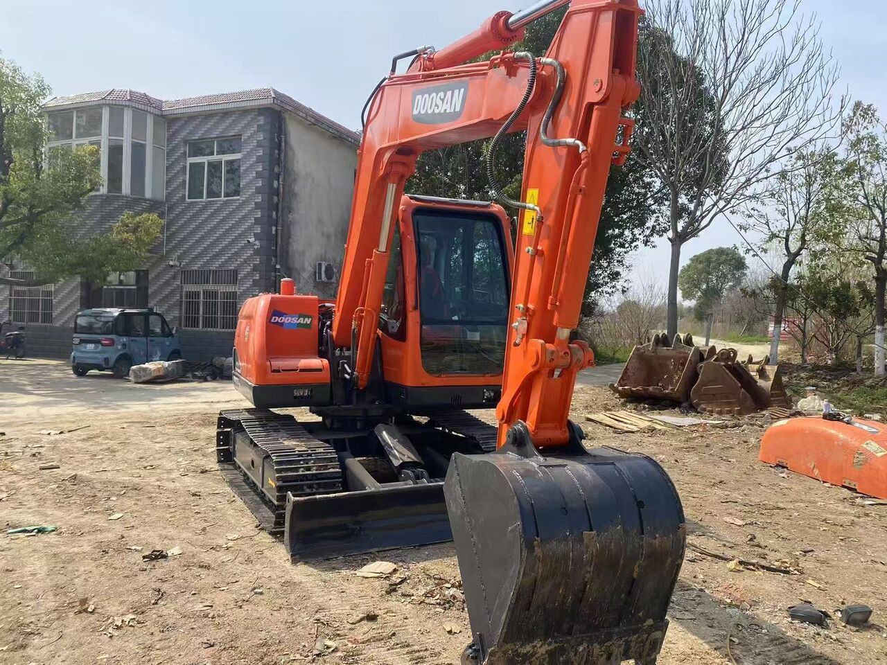 2024 Doosan DX75-9C mini excavator, front three-quarter view 2024 Doosan DX75-9C mini excavator, front three-quarter view