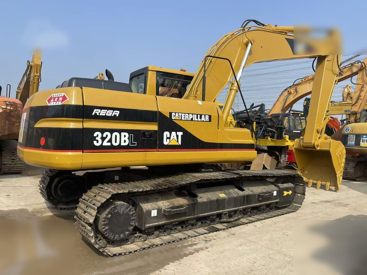 2020 Caterpillar 320BL crawler excavator, rear three-quarter view 2020 Caterpillar 320BL crawler excavator, rear three-quarter view