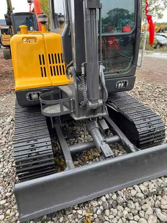 2023 Volvo EC60D crawler excavator, front view of the undercarriage and blade