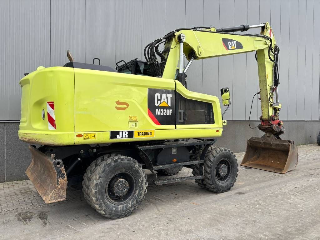 2015 Caterpillar M320F wheel excavator, rear three-quarter view
