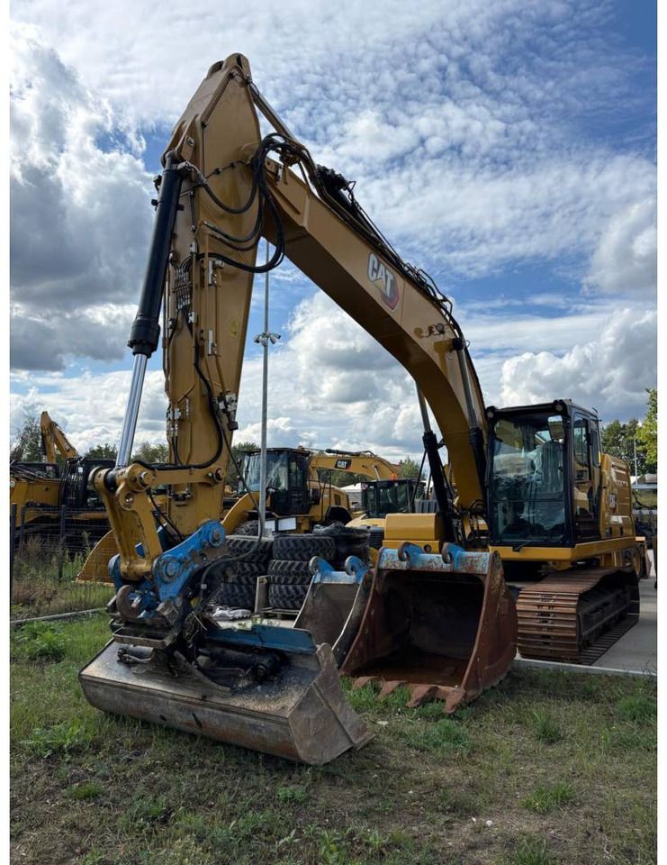 2022 Caterpillar 320GC crawler excavator, front three-quarter view