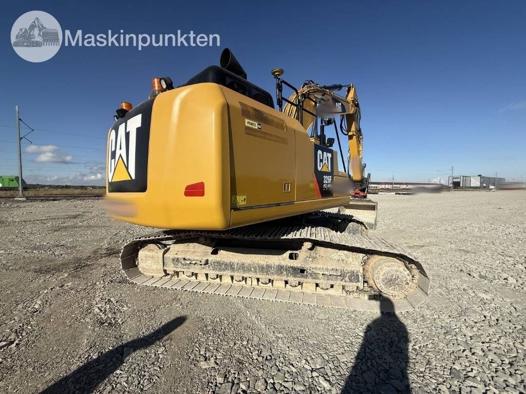 2017 Caterpillar 326F HDHW crawler excavator, rear three-quarter view 2017 Caterpillar 326F HDHW crawler excavator, rear three-quarter view