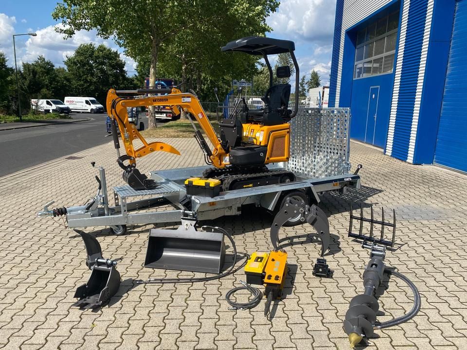 Berger Kraus BK1300JSR mini excavator on trailer with attachments