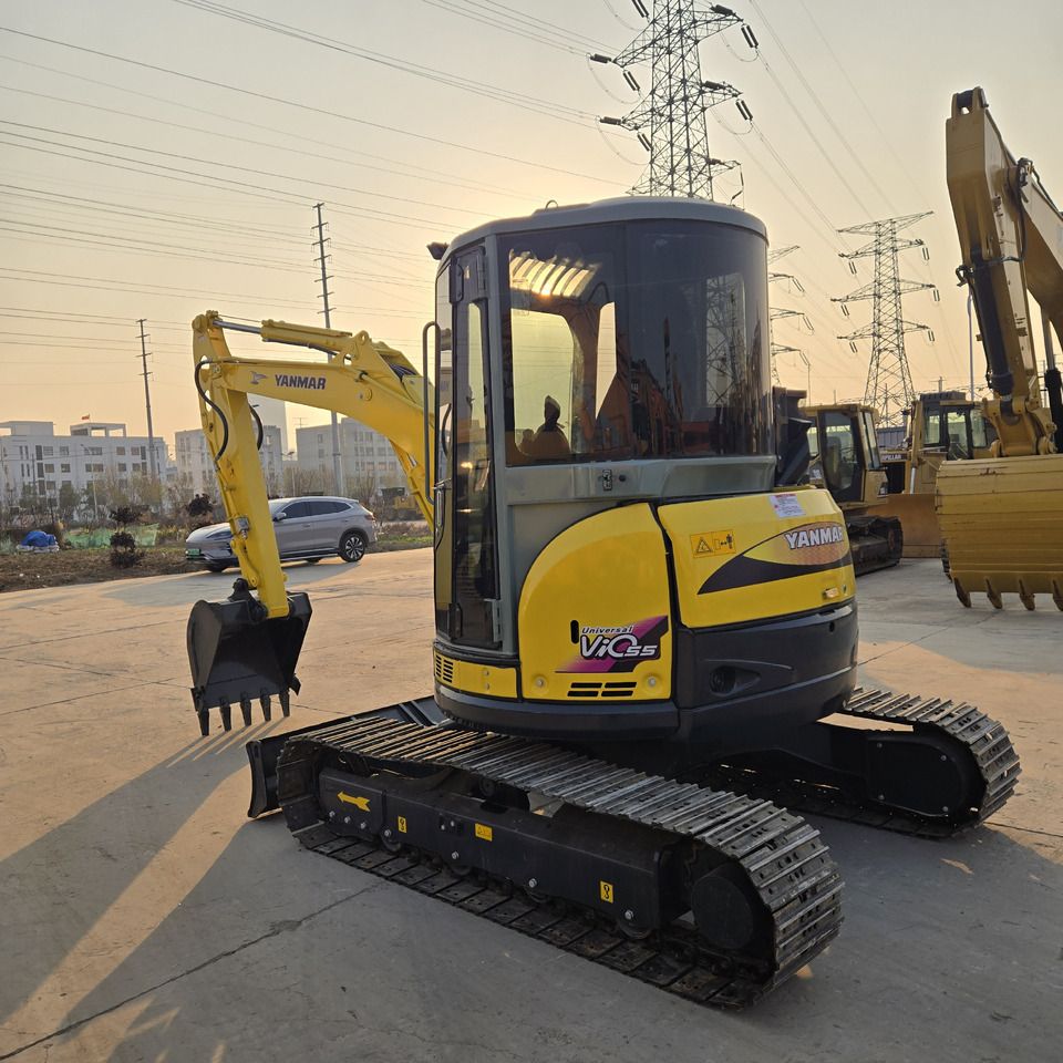 2022 Yanmar VIO55 mini excavator, rear three-quarter view 2022 Yanmar VIO55 mini excavator, rear three-quarter view