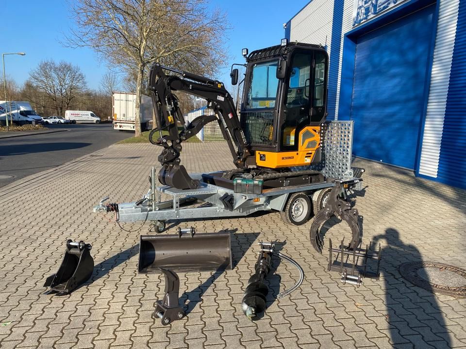 Berger Kraus BK2000NKSR mini excavator on trailer with attachments Berger Kraus BK2000NKSR mini excavator on trailer with attachments